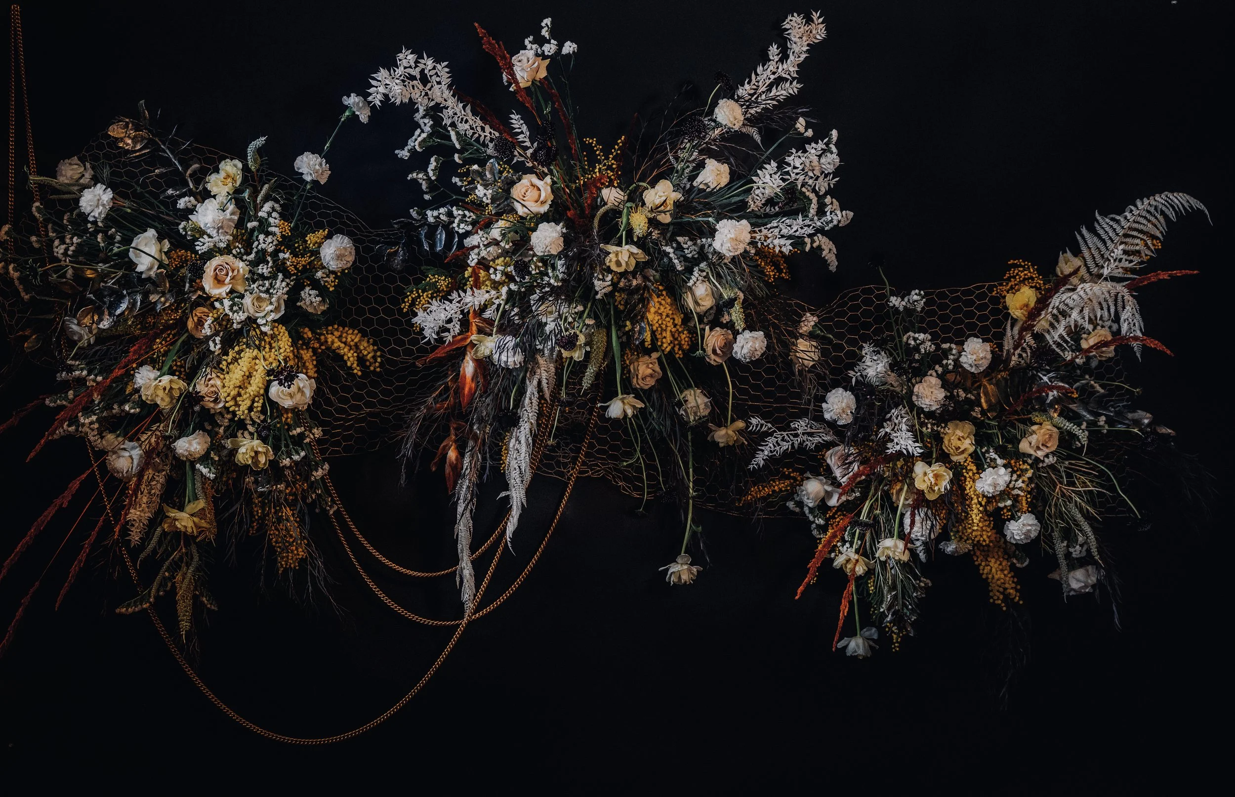 Dramatic modern reception floral installation
